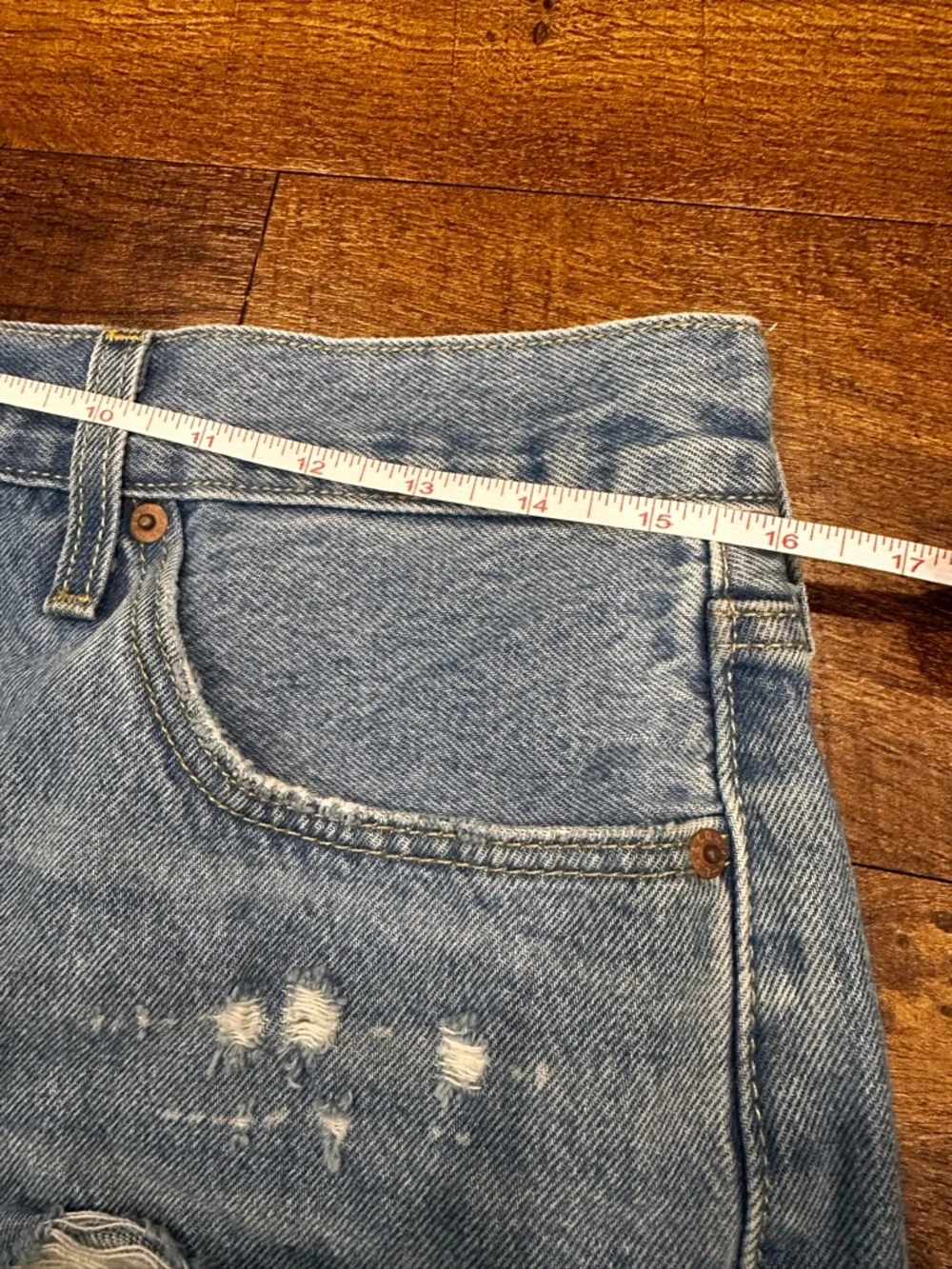 Levi's Distressed Light Blue High-Rise Denim Shorts